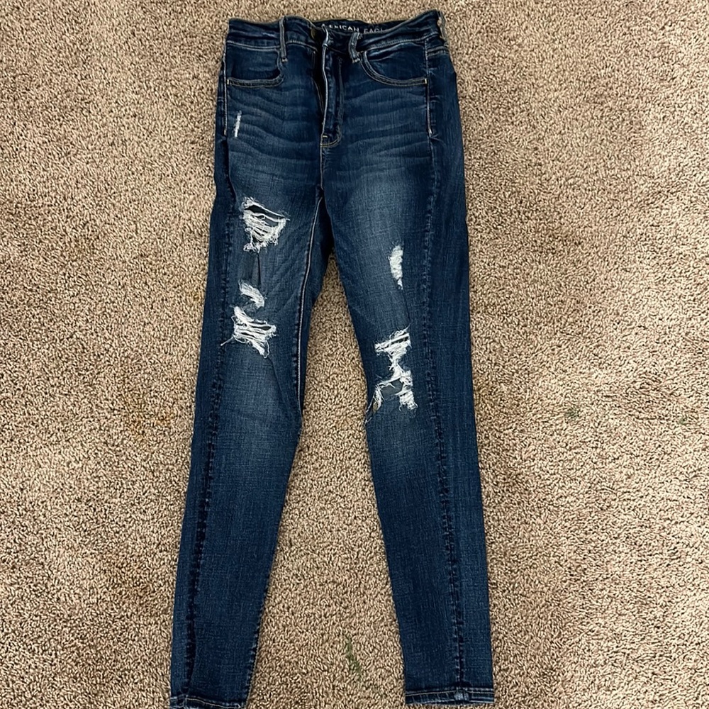 Women’s American Eagle size 4 skinny distressed jeans.